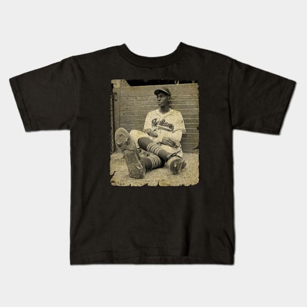 Satchel Paige Watches His Teammates Practice, 1948 Kids T-Shirt by SOEKAMPTI